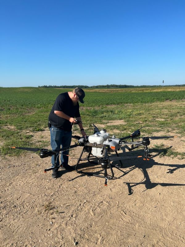 Owner, Brian Halonen, preparing drone for flight
